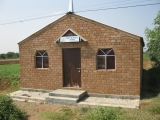 <p>A one-day church in the Ongole Conference. Notice the damage to the door. Many of the churches that were built by various teams that came to India to evangelize are now closed. We encouraged the Conference to work longer with the people as we recognized that many had been prematurely baptized without proper discipleship and that is why they are leaving the churches or lowering the standards of the faith to suit their needs.</p>